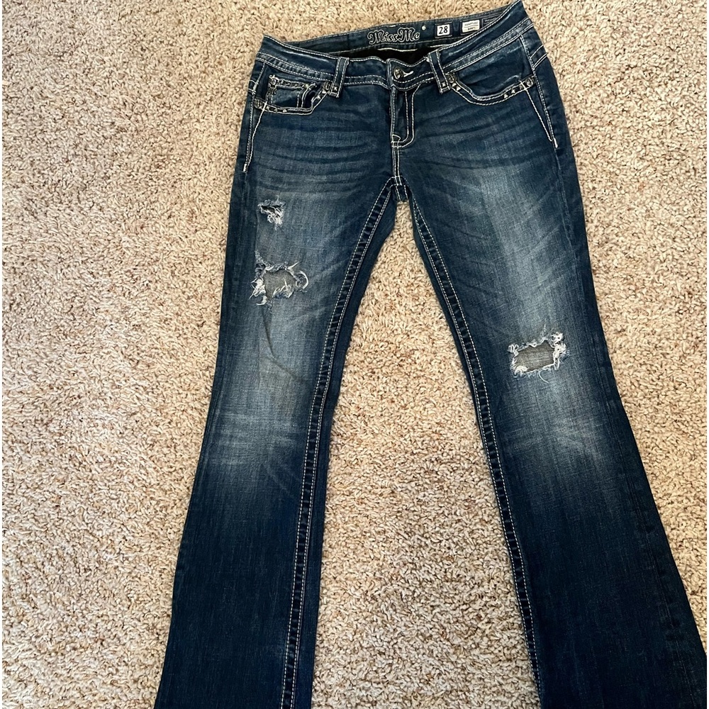 Miss Me Torn Bootcut jean